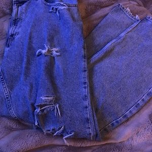 Vintage late 90s Tommy Hilfiger jeans naturally distressed.